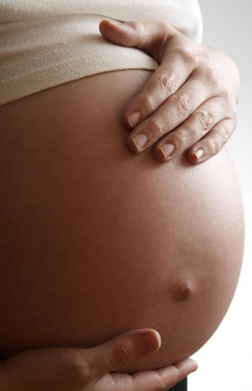It can be difficult to find a comfortable position to sleep or sit during the later stages of pregnancy.
