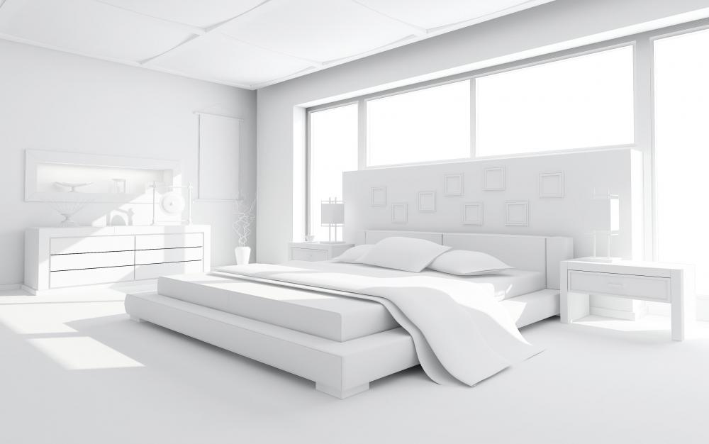 A bed with king size pillows.