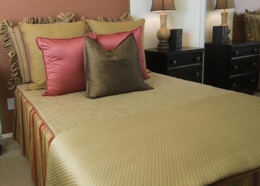 Accent pillows often have to be removed from a bed before going to sleep at night.