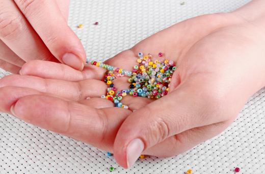 Pillows may be embellished with beads.