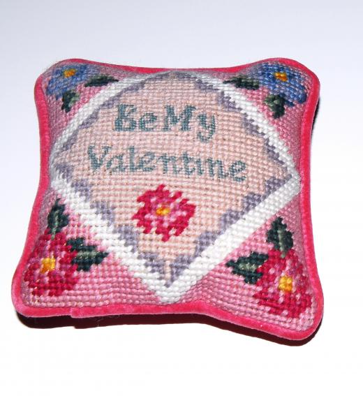 Needlepoint pillows with sayings, quotes, or pictures can take center stage in a room.